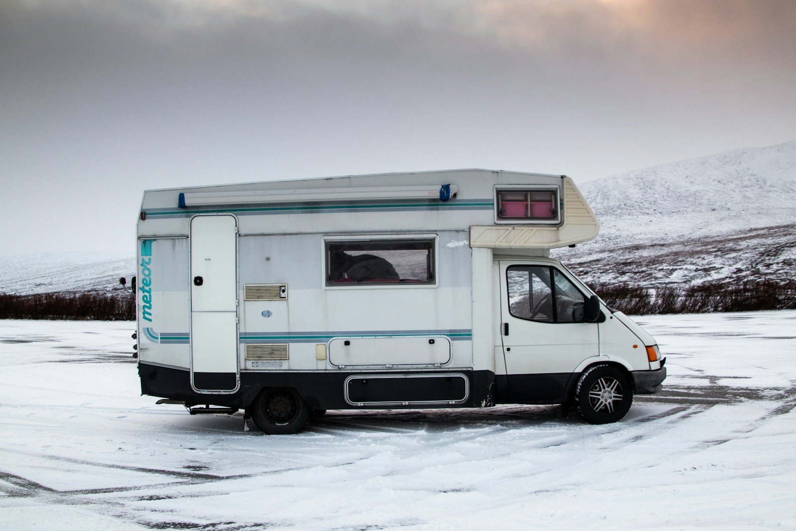 a white van in the snow, RV