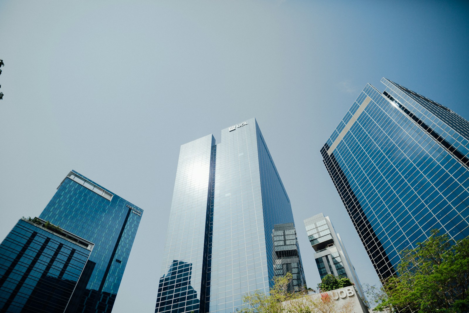 low angle photography of high rise building